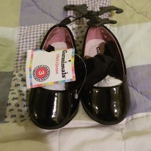 Black baby dress shoes.